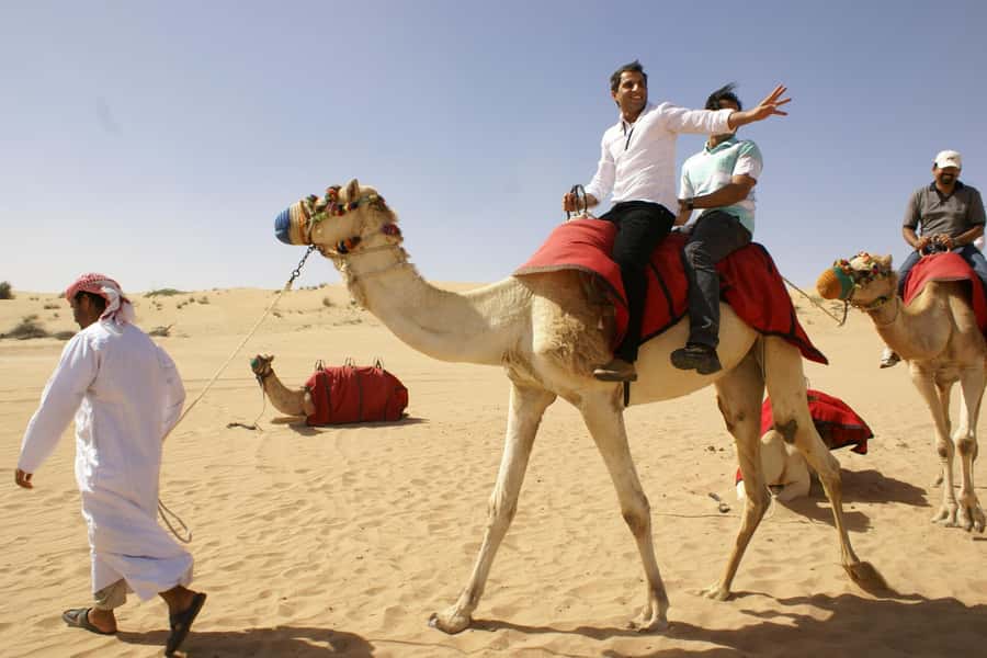 Dubai: Evening Tour with Quad Biking, Camel Ride, and BBQ - Optional Quad Biking: Your Own Pace, With Serious Responsibility