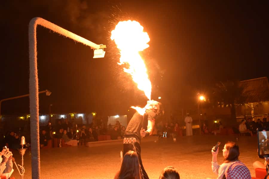 Dubai: Evening Tour with Quad Biking, Camel Ride, and BBQ - BBQ Dinner and Live Shows: Tanoura, Fire, Dance, and Shisha Lounge Time