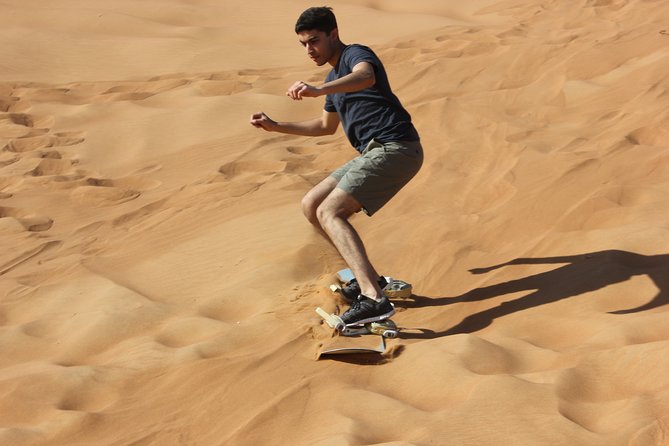 Dubai: Extreme Red Dune Buggy Desert Safari Adventure - The Highest-Dune Sandboarding Moment