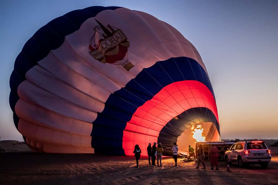 Dubai: Hot Air Balloon, Desert Safari, and Quad Biking Tour - Sunrise hot air balloon over the dunes: what you’re really buying
