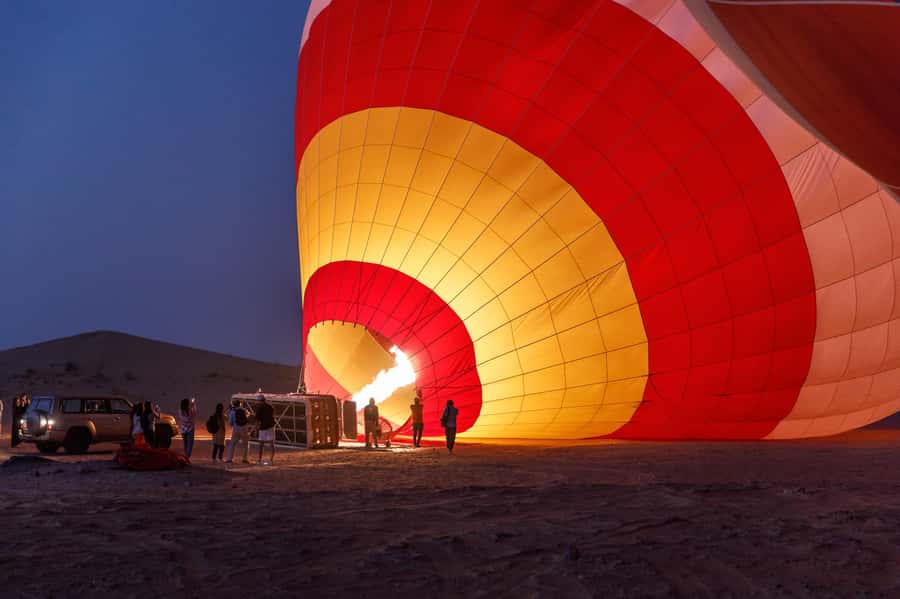 Dubai: Hot Air Balloon, Desert Safari, and Quad Biking Tour - Dune bashing and quad biking: thrill level, timing, and safety vibe