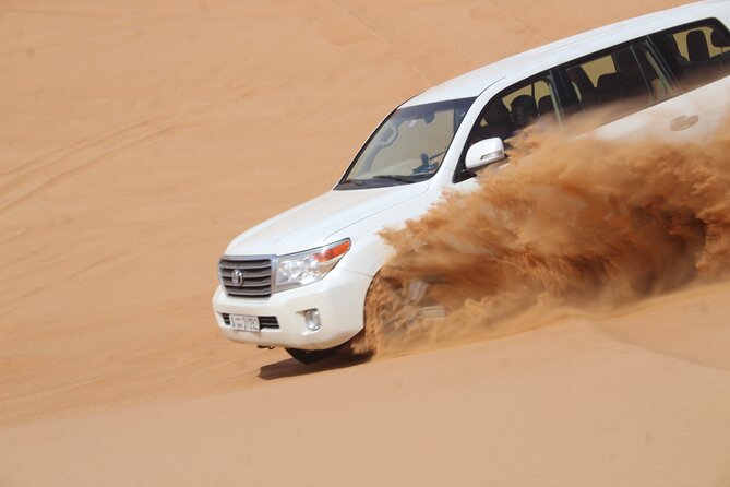 Dubai: Jeep Desert Safari, Camel Ride, and Quad Bike Tour - Sandboarding Stop: Short Session, Big Photo Value