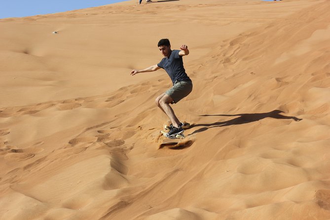 Dubai: Jeep Desert Safari, Camel Ride, and Quad Bike Tour - Al Aweer Camp BBQ and Traditional Entertainment