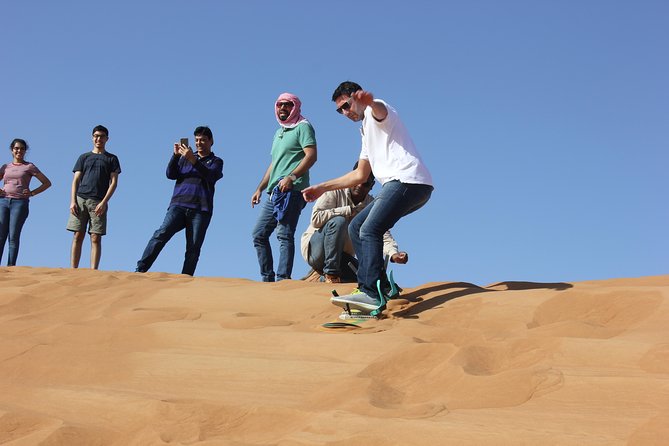 Dubai: Jeep Desert Safari, Camel Ride, and Quad Bike Tour - Pickup, Timing, Weather, and Group Size Reality