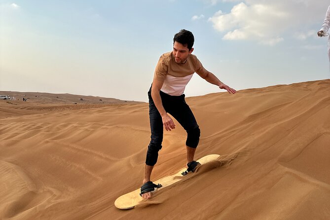 Dubai Morning 4 Seater Buggy Tour Sand Boarding & Camel ride - Camel ride and sandboarding: the classic desert moments you shouldn’t skip