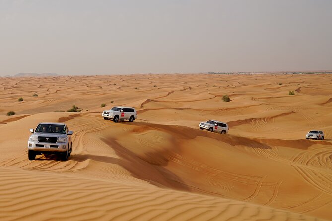 Dubai Morning Desert Safari with Quad Biking & More Activities - The action lineup: quad biking, dune bashing, and sandboarding