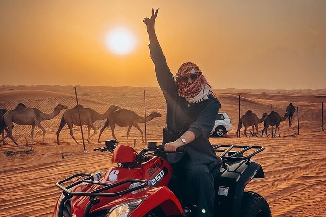 Dubai: Morning Quad bike & Safari Adventure , Sandboarding, camel - Sandboarding on soft dunes: fun slides without the guesswork