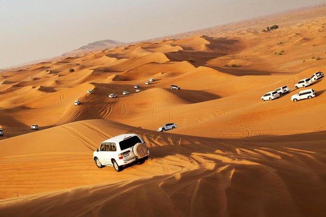 Dubai Morning Safari: Quad Biking, Sandboarding & Camel Ride! - Quad biking at Lahbab: the self-drive circuit that sells this tour