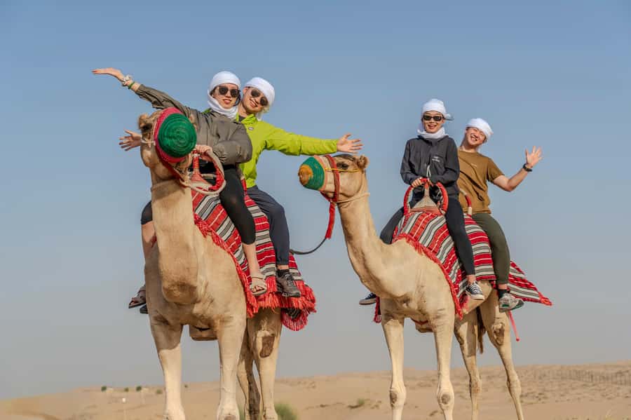 Dubai: Quad Bike Safari, Camels & Al Khayma Camp BBQ Dinner - Sandboarding and the dune-photo stretch