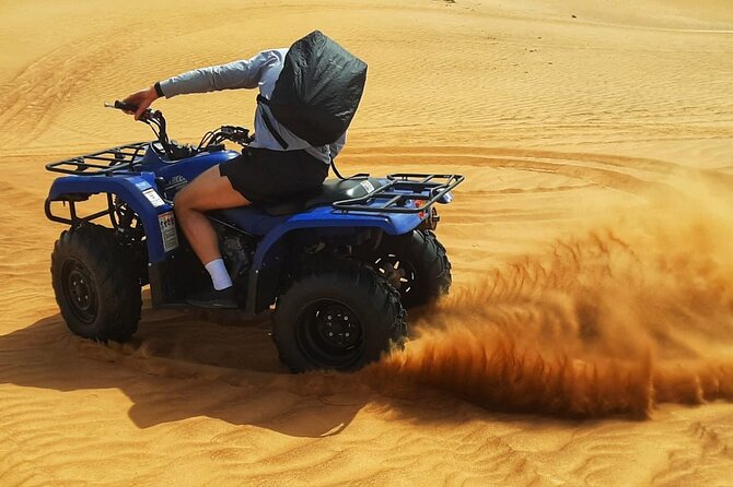 Dubai: Quad Bike Safari, Camels, & Camp with BBQ Dinner - Key highlights you’ll care about