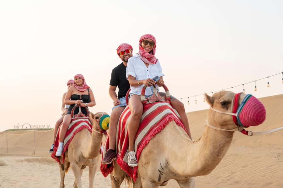 Dubai: Red Dune Desert Safari, Quad Bike, Camels, and BBQ - Quad biking: the adrenaline boost that comes with real responsibility