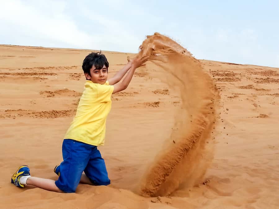 Dubai: Red Dune Safari, Quad Bike, Camel Ride, BBQ Dinner - Camel ride and Bedouin-style calm: the reset after speed