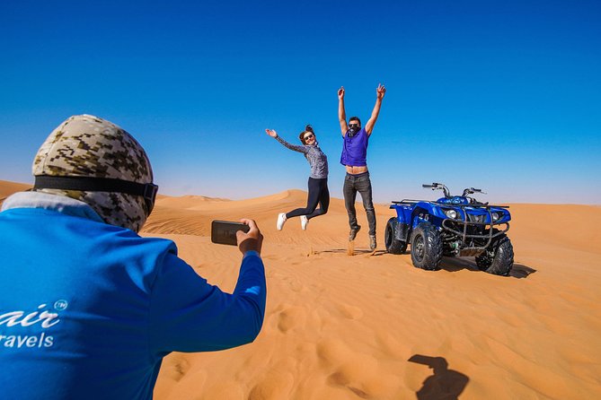 Dubai Red Dunes ATV, Camels, Stargazing & 5<em> BBQ Al Khayma Camp – Key things I’d watch for before you go’ /></p>
<ul>
<li><strong>A 60-minute ATV session</strong> on red-orange Lahbab dunes with an instructor and helmet included</li>
<li><strong>Sandboarding and photos</strong> tucked in right after the quad ride, when you still have energy</li>
<li><strong>Al Khayma “5-star” camp extras</strong>: Arabic coffee, camel ride, henna (women only), falcon photo moments</li>
<li><strong>Evening-slot payoff</strong>: fire show and stargazing are tied to nighttime departures</li>
<li><strong>Small-group feel (max 15)</strong>, which usually makes the schedule feel tighter and calmer</li>
</ul>
<h2 id="lahbab-red-dunes-and-the-atv-that-actually-feels-like-atv-time">Lahbab Red Dunes and the ATV that Actually Feels Like ATV Time</h2>
<p><img width="669" height="446" decoding="async" src=