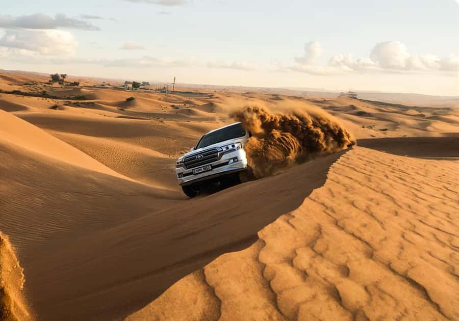 Dubai: Red Dunes Morning Desert Quad, Buggy or 4x4 Ride - The Camel + Sandboarding Combo That Works for Families