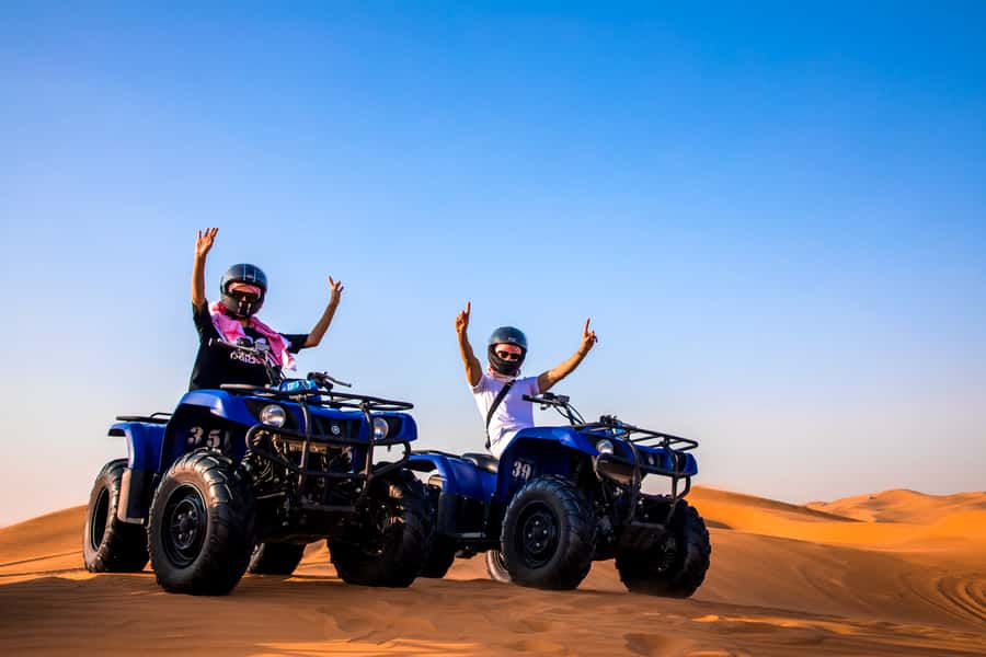 Dubai: Red Dunes Quad Bike, Dune Buggy, Camel & Refreshments - Sandboarding at the halfway break