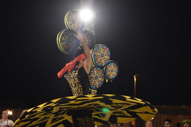 Dubai Red Dunes Quad Bike Tour,Sandboard, Camel ride & BBQ Dinner - BBQ dinner plus the shows: what you’re really paying for