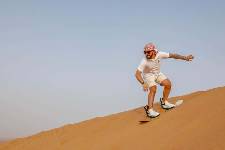 Dubai: Red Dunes Quad Bike with Sandboarding, Camels and BBQ - Lahbab’s Red Dunes: The Real Reason This Feels Like Dubai’s Desert
