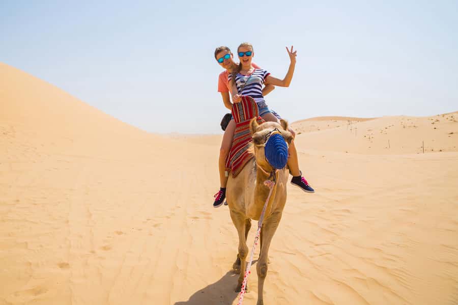 Dubai: Red Dunes Quad Bike with Sandboarding, Camels and BBQ - Pickup Time, Road Comfort, and What 7 Hours Really Means