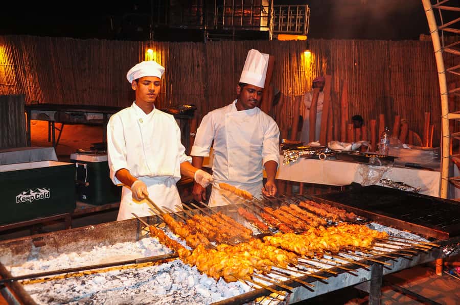 Dubai: Safari, Quad Bike, Camel Ride, and Buffet Dinner - From your hotel to the dunes: the first 90 minutes