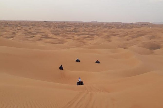 Dubai: Unique MORNING Quad Bike Red Dunes Safari - Dubai’s Red Dunes at sunrise: calmer air, better light