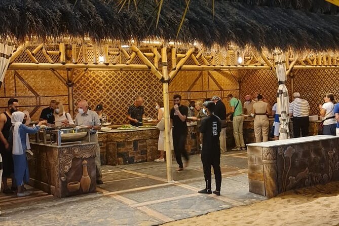 Dubai: Unique SUNSET Buggy Red Dunes Safari - Sandboarding and Camel Ride: Two Different Speeds of Desert Life