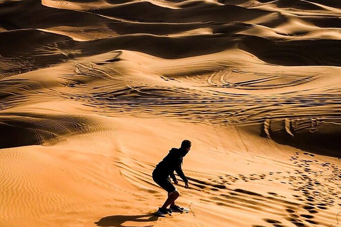 Dubai Unique Sunset Combo: 4WD and Quad Bike Red Dunes Safari - Camel Ride and Picture Time: Where the Tour Slows Down