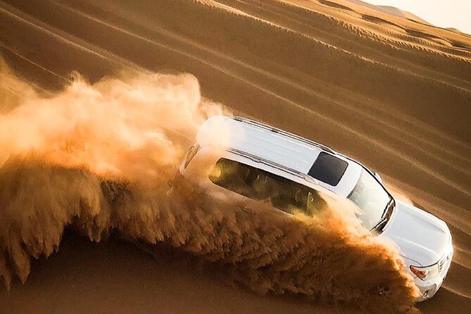 Dubai Unique Sunset Combo: 4WD and Quad Bike Red Dunes Safari - The 4WD Dune Bashing + Sandboarding Part: What You’re Really Buying