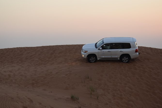 Dune Bashing with Quad Bike and Sand Boarding from Dubai - Getting Set Up: Safety Briefing, Helmets, and Dust Control