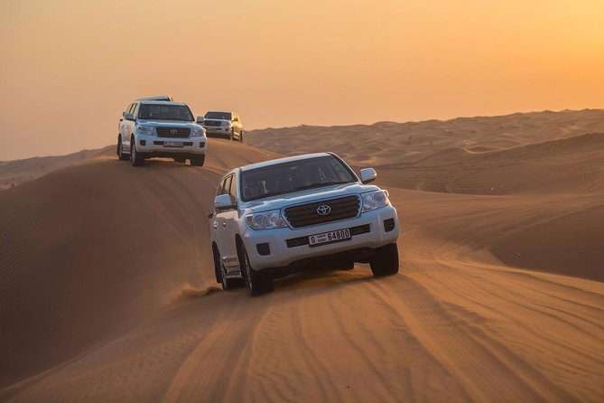 Evening Desert Adventure: Quad Biking, Sandboarding & Camel Ride - Sandboarding and photo stops: small wins that make the night feel complete