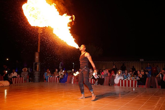 Evening Desert Adventure: Quad Biking, Sandboarding & Camel Ride - Desert Premium Camp: coffee, henna, BBQ, and the show schedule