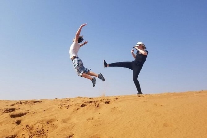 Evening Desert safari Dubai With Quad Bike Ride & BBQ dinner - Sunset and photo stops: where you slow down on purpose