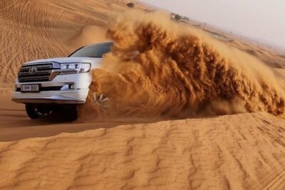 Evening Desert safari Dubai With Quad Bike Ride & BBQ dinner - Dune bashing: the 30-minute adrenaline hit