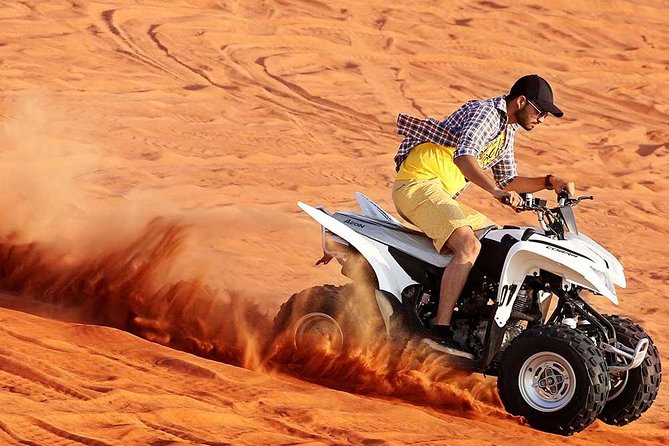 Evening Desert Safari with BBQ Dinner & self-drive Quad biking - Dinner under the stars: BBQ, shows, and camp energy