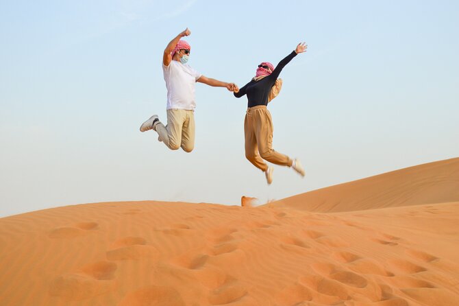 Evening Desert Safari with Quad Bike, BBQ Dinner and Camel Ride - The traditional camp experience: majlis seating, henna, shisha, and camel rides