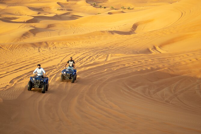 Evening Desert Safari with Quad Bike, BBQ Dinner and Camel Ride - Stop at the dunes: that 45-minute red-dune dune bashing segment