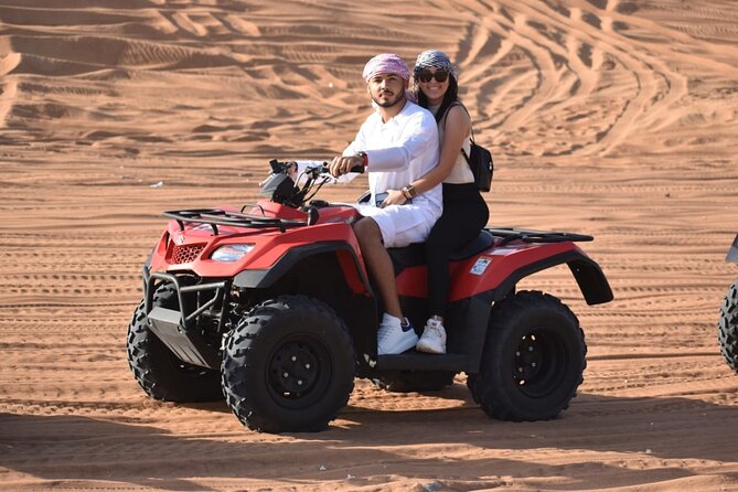 Evening Desert Safari with Quad Bike, Camel Ride & BBQ Dinner - Key moments you’ll remember