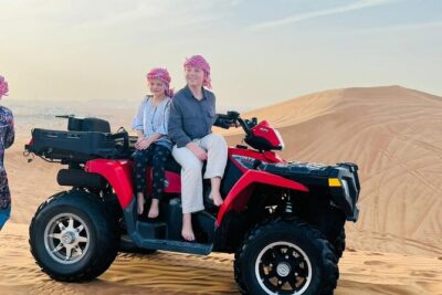 Evening Desert Safari with Quad Bike, Camel Ride & BBQ Dinner - Dune bashing on high dunes: thrill, but hold onto your seat