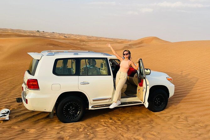 Evening Desert Safari with Quad Bike, Camel Ride & BBQ Dinner - Henna, Arabian attire, and shisha smoke without the pressure