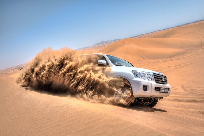 Evening Red Dunes Safari with Quad Biking, BBQ Dinner & LiveShows - Live Dance Shows Under the Stars: Belly Dance, Tanoura, Fire