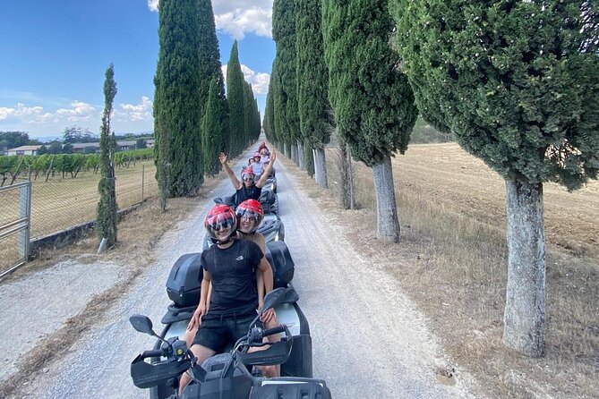 Exciting ATV tour in the Tuscan countryside - Passing Castello di Badia a Berardenga without slowing down