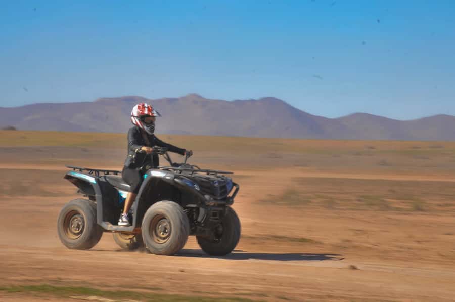 From: Marrakech: Lalla Takerkoust Lake Quad Bike Experience - Quad biking through High Atlas oases, wadis, and village paths