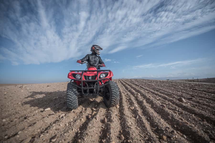 From Marrakech: Premium Agafay Desert Half-Day Quad Biking - Riding the Rock-Desert Trails: Dry Rivers, Hills, and Berber Villages