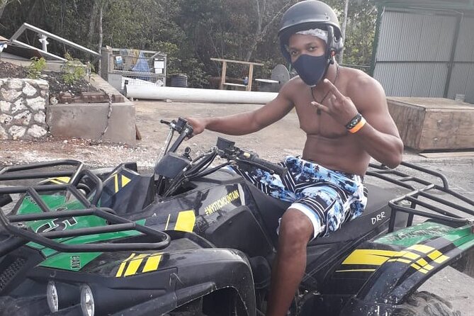 Full Day ATV, Ricks Café, Beach and Shopping Tour from Montego Bay - Seven Mile Beach at Margaritaville: relax hard, then re-fuel