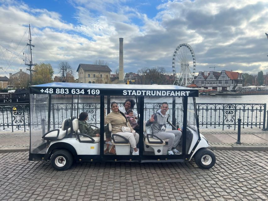 Gdansk: City Sightseeing Tour by Golf Cart/Buggy Guided Tour - Medieval harbor views: Great Harbor Crane and the shipyard story
