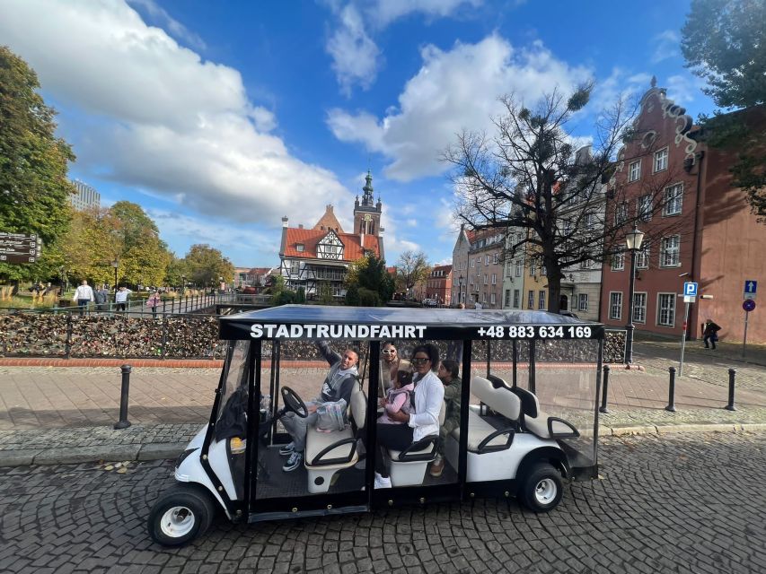 Gdansk: City Sightseeing Tour by Golf Cart/Buggy Guided Tour - Small stops that add local texture: the carousel and Hala Targowa