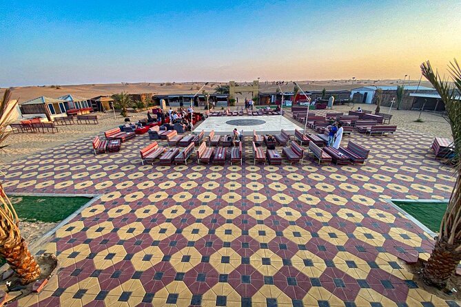 Guided Desert Safari with Dinner and Quad Biking in Dubai - Al Awir Camp: Coffee, Dates, Henna, Shisha, and the Evening Show
