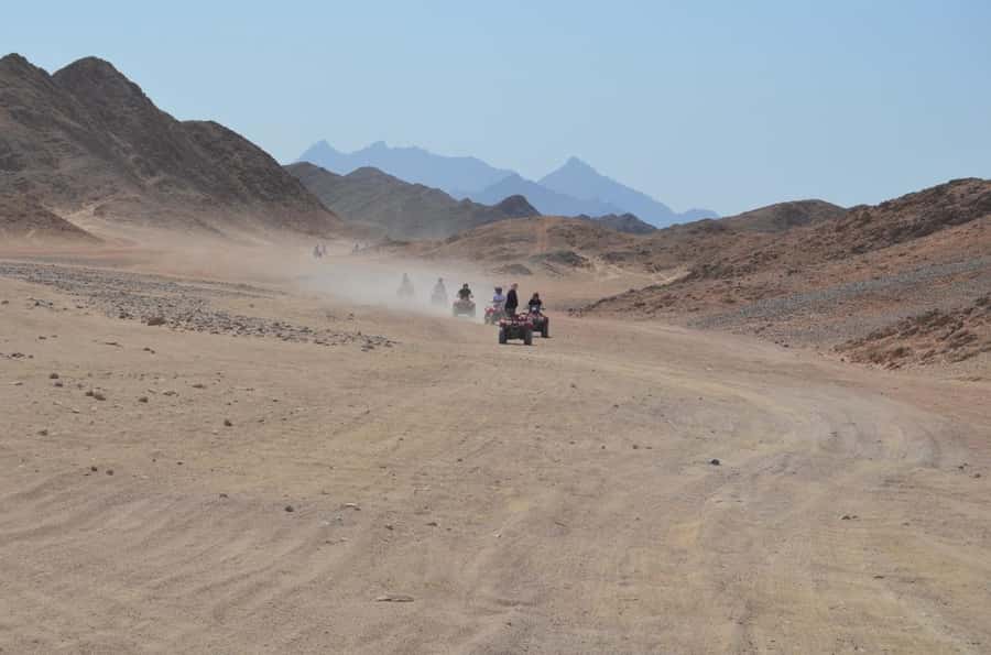 Hurghada: Red Sea Desert Quad Biking Tour & Sand Mountain - Sand mountain climb and the tea-and-photos break