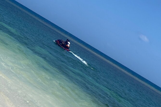 Jet Skiing and ATV from Montego Bay - Tropical Bliss Beach Jet Ski: Orientation, Then Speed on Jamaica Water