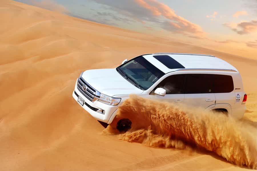 Luxury Dubai Desert Safari, BBQ, Camel Ride, Quad Bike, Show - Camel rides, horse rides, falcon display, and henna painting