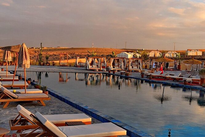 Marrakech Agafay Desert Package Quad Bike&Camel POOL Dinner Show. - Fire celebration and traditional dances: the energy shift at sunset